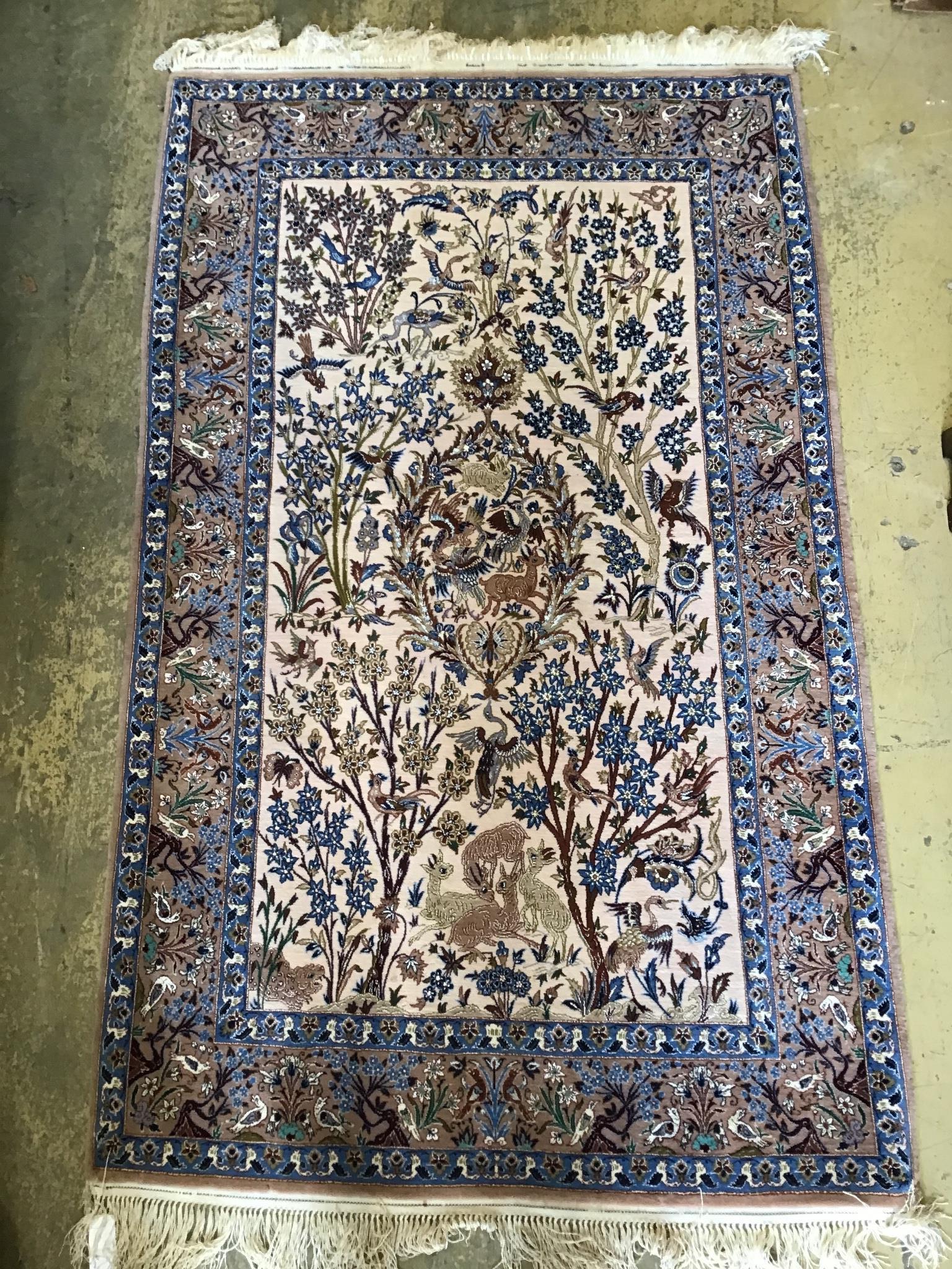 A Tabriz peach ground part silk pictorial rug, 180 x 111cm